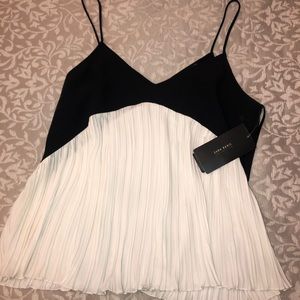 white and black tank top blouse